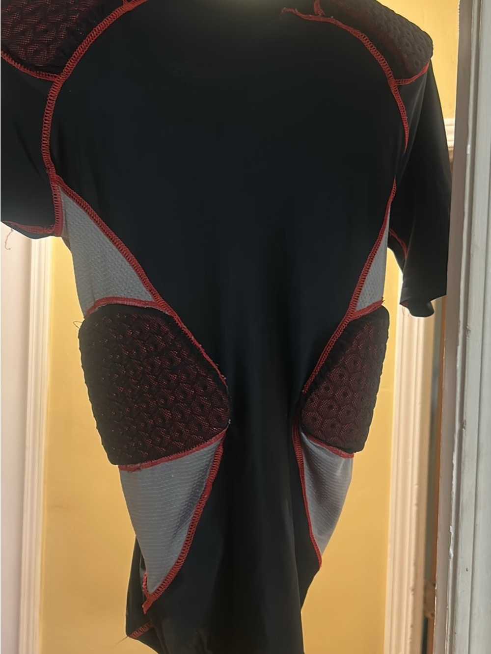 Black Athletic Padded Performance Shirt with Red Trim